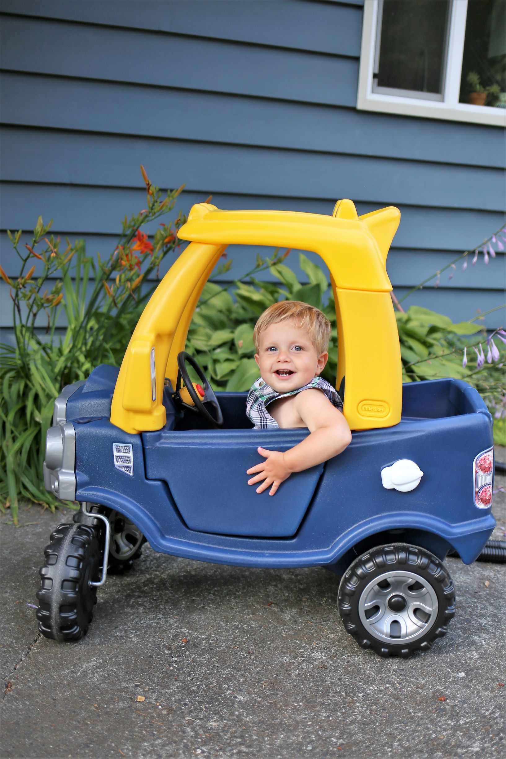 The Little Tikes Cozy Coupe Truck is a great gift for any toddler boy. This toddler pickup truck will be a backyard favorite throughout the toddler years. If you're wondering about great gifts for toddler boys, this Cozy Coupe truck is a great one for birthdays or Christmas #giftsforkids #cozycoupe #toddlertoys